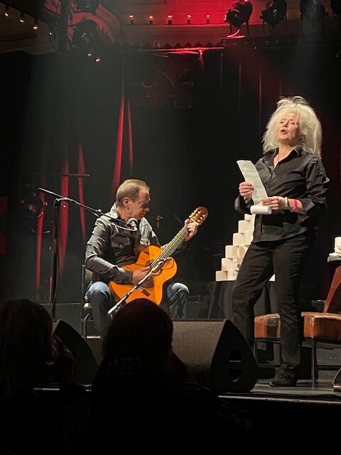 Poetess Diana Ozon with Peter van Abbe on guitar, Paradiso, Amsterdam, 12 December 2021